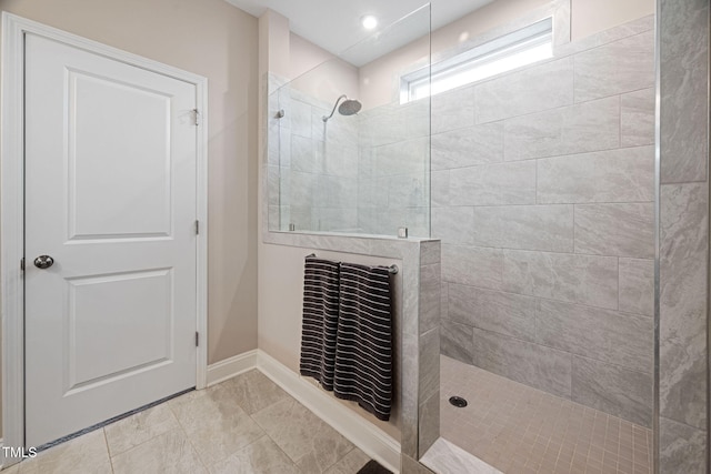 bathroom featuring tiled shower