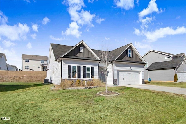 view of front facade featuring a garage, a front lawn, and central air condition unit