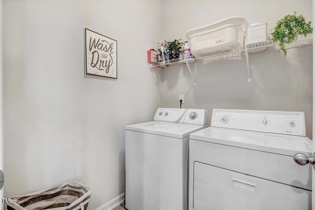 laundry area featuring washer and clothes dryer