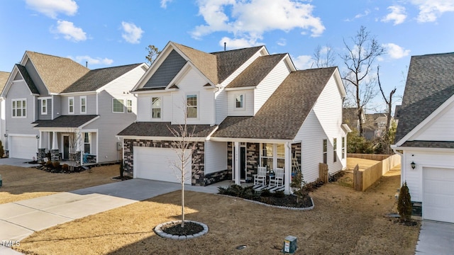 view of front of house with a garage and a porch