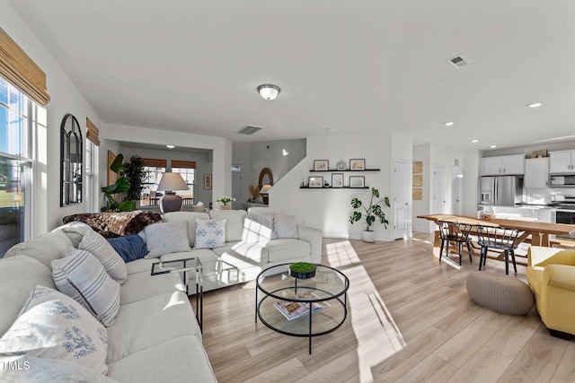 living room featuring light wood-type flooring