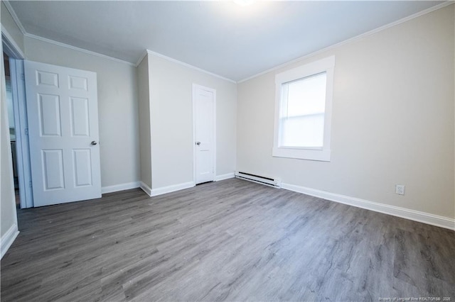 unfurnished bedroom featuring dark hardwood / wood-style flooring, ornamental molding, and a baseboard radiator