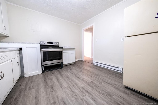 kitchen with electric stove, white cabinetry, light wood-type flooring, a textured ceiling, and baseboard heating