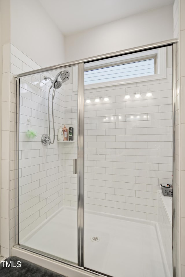 bathroom featuring walk in shower