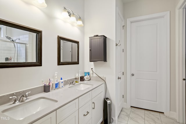 bathroom with walk in shower and vanity