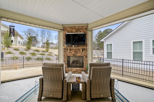 view of patio / terrace with an outdoor stone fireplace