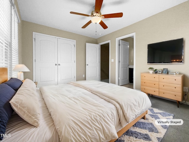 bedroom with carpet, a closet, and ceiling fan