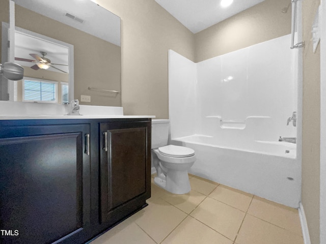 full bathroom featuring tub / shower combination, tile patterned flooring, ceiling fan, toilet, and vanity