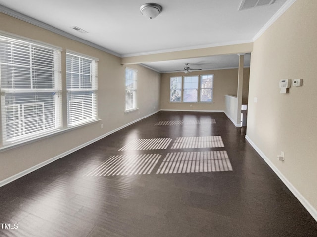 unfurnished room with ceiling fan, ornamental molding, and ornate columns