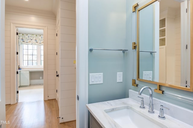 bathroom featuring vanity and hardwood / wood-style floors