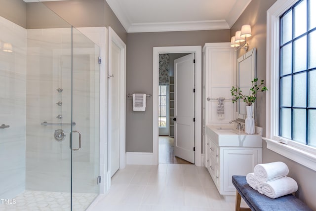 bathroom featuring crown molding, vanity, and a shower with shower door