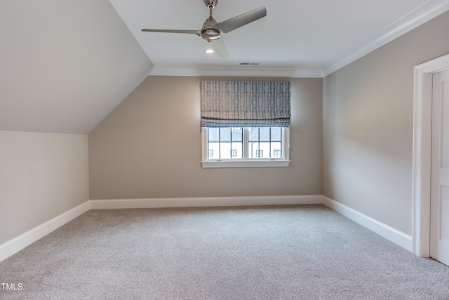 bonus room with lofted ceiling, carpet flooring, and ceiling fan