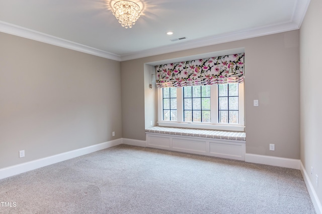 unfurnished room with a notable chandelier, carpet floors, and ornamental molding