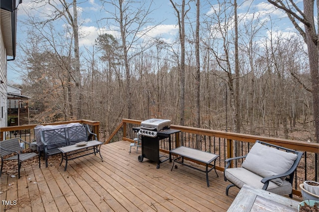 wooden terrace featuring grilling area