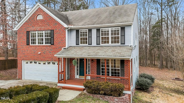 view of front of house with a garage and covered porch