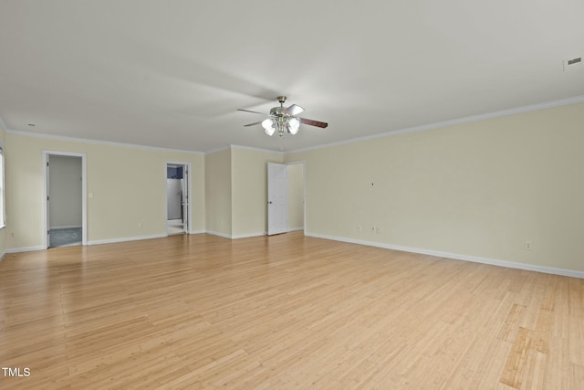 spare room with crown molding, ceiling fan, and light wood-type flooring