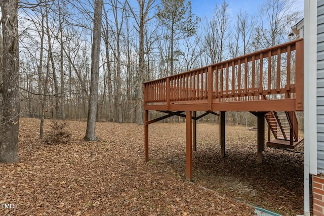 view of yard featuring a wooden deck