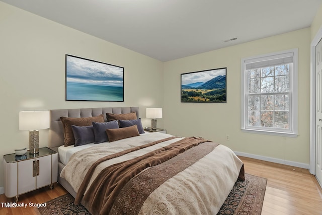 bedroom featuring light hardwood / wood-style floors