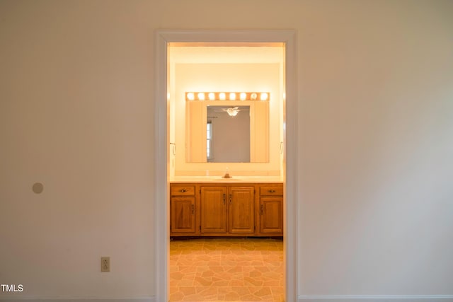 hallway featuring sink