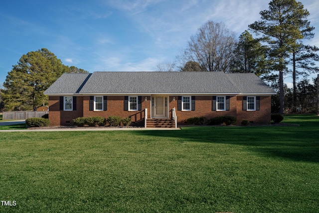 ranch-style house featuring a front lawn