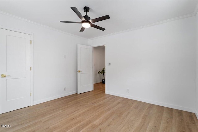 unfurnished bedroom featuring ornamental molding, light hardwood / wood-style floors, and ceiling fan