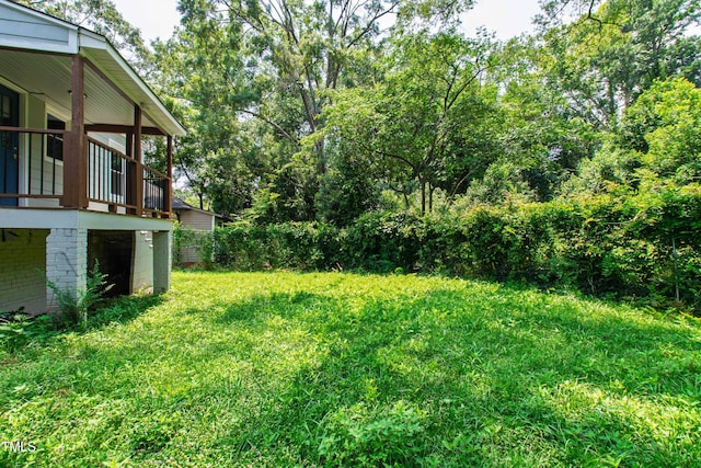 1606 James St, Durham, NC 27707 - view of grassy yard with a deck