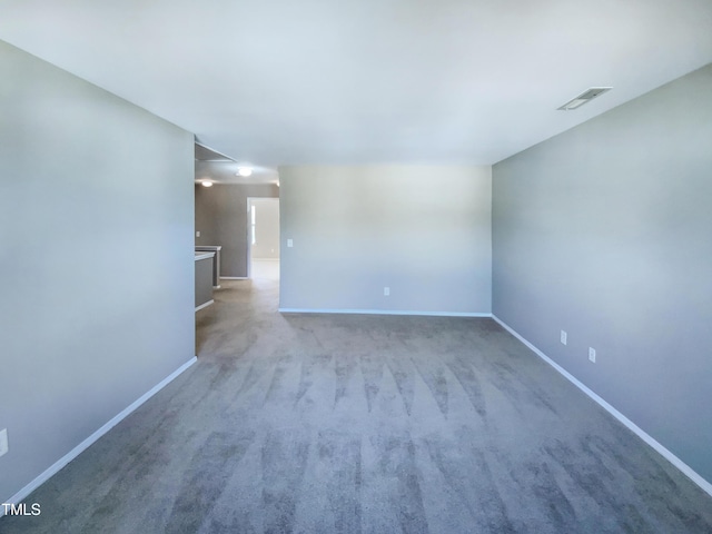 unfurnished room featuring carpet floors