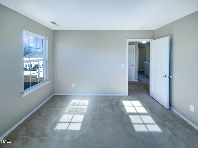 view of carpeted spare room