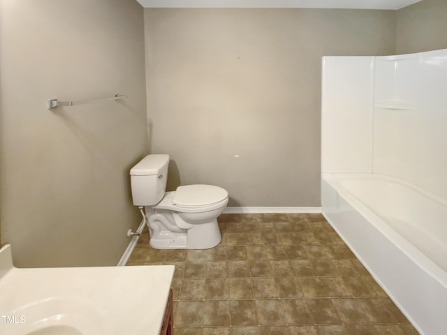 bathroom with toilet and vanity