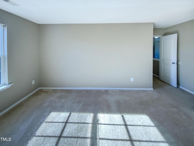 empty room with carpet floors