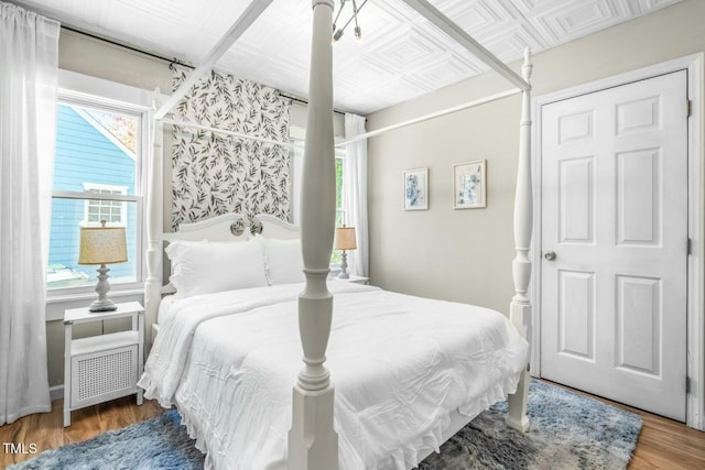 bedroom featuring hardwood / wood-style floors