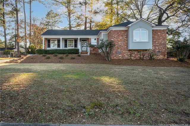 view of front of property with a front lawn and a porch