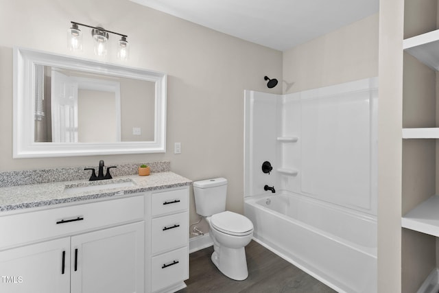 full bathroom featuring hardwood / wood-style floors, toilet, vanity, and  shower combination