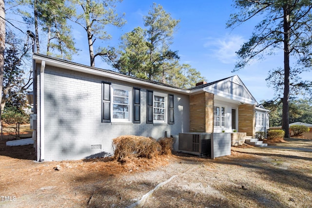 view of property exterior with cooling unit