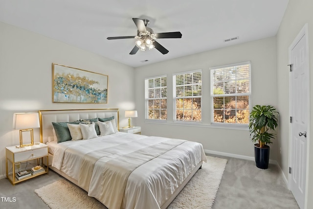 carpeted bedroom with ceiling fan