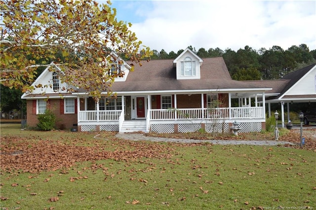 view of front of house with a front lawn and a porch