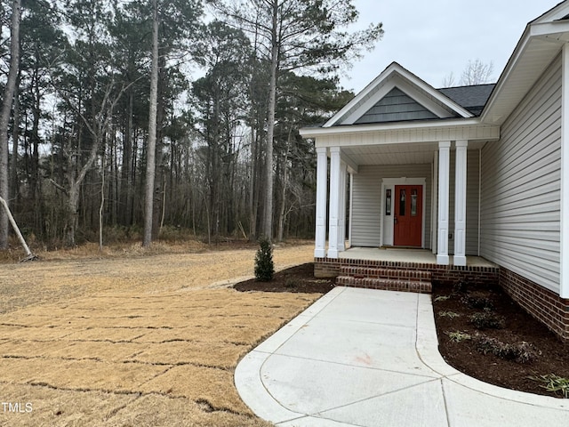 property entrance with a porch