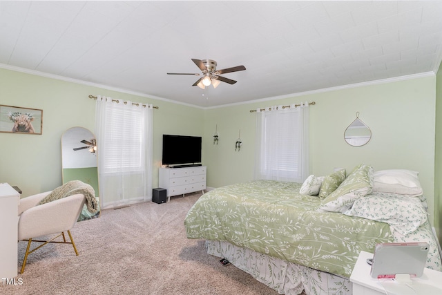 bedroom featuring light carpet, ceiling fan, and ornamental molding