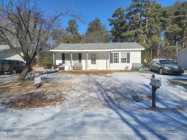 view of front of property featuring covered porch