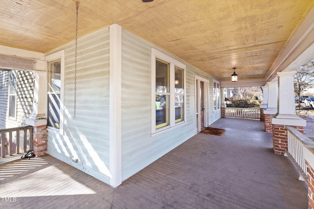 deck featuring covered porch