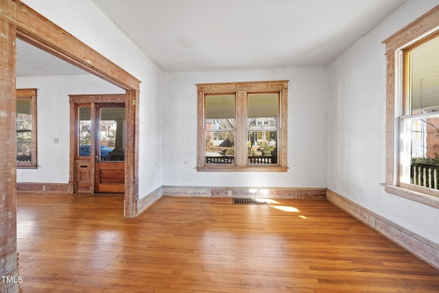 empty room featuring wood-type flooring