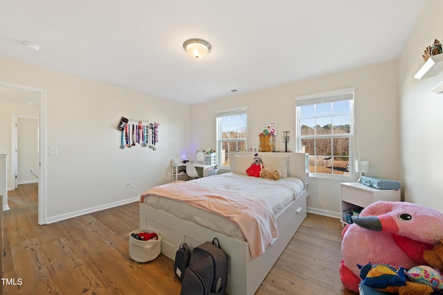 bedroom featuring light hardwood / wood-style floors