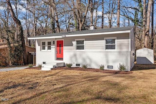 view of front facade featuring a front yard