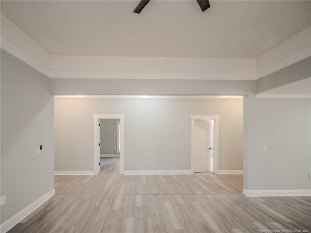 empty room with light hardwood / wood-style flooring