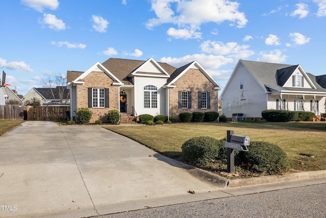 view of front of property with cooling unit and a front lawn