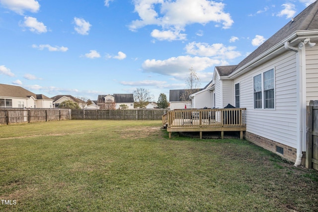 view of yard with a wooden deck