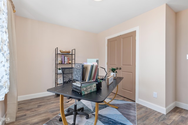 office space with hardwood / wood-style flooring