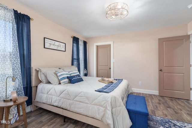 bedroom featuring dark hardwood / wood-style floors