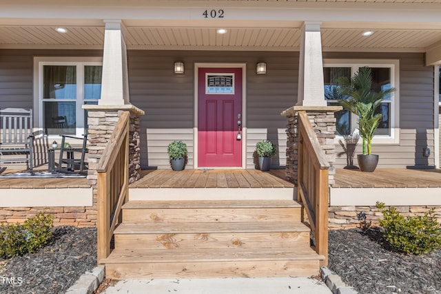 doorway to property with a porch