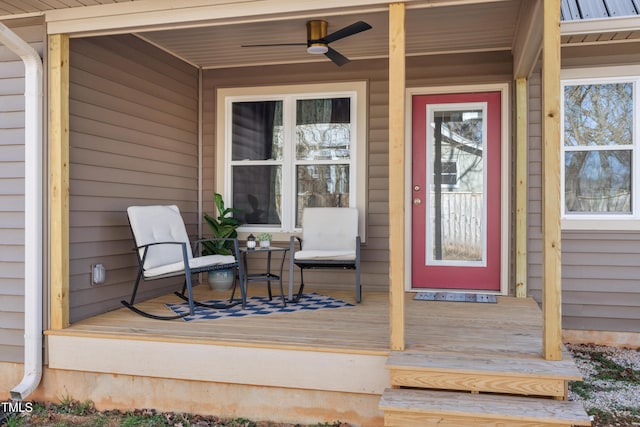 doorway to property with covered porch and ceiling fan